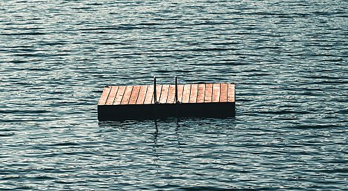 Police boat needed after BC Interior man swims to raft in middle of lake after domestic incident